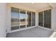 Covered patio featuring concrete floors and sliding glass doors that lead inside at 9543 W Parkway Dr, Tolleson, AZ 85353