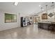 Bright, modern kitchen with stainless steel appliances and a functional center island at 10621 W Pima St, Tolleson, AZ 85353