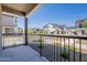 Community view from the balcony with decorative flower beds at 11300 N Casa Dega Dr # 1027, Surprise, AZ 85388