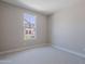 Bedroom bathed in natural light from the window at 11300 N Casa Dega Dr # 1027, Surprise, AZ 85388