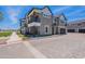 Stunning two-story home with a balcony, three-car garage and beautiful landscaping at 11300 N Casa Dega Dr # 1027, Surprise, AZ 85388