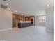 Open concept kitchen features stainless appliances, large island and recessed lighting at 11300 N Casa Dega Dr # 1027, Surprise, AZ 85388