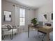 A modern office with a sleek desk, comfortable chair, and a large window providing natural light at 11300 N Casa Dega Dr # 1027, Surprise, AZ 85388
