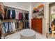 Spacious walk-in closet with custom shelving and mirrored doors for ample storage at 11821 S Tuzigoot Ct, Phoenix, AZ 85044
