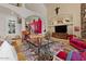 Open-concept living room with high ceilings, neutral color scheme, and elegant decor at 11821 S Tuzigoot Ct, Phoenix, AZ 85044