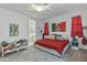 A large bedroom features a ceiling fan and neutral-colored carpets at 12374 W Locust Ln, Avondale, AZ 85323