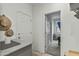 Mud Room featuring tile floors, doors, coat rack and built in shelves at 12374 W Locust Ln, Avondale, AZ 85323