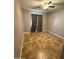 Bedroom featuring neutral walls, tile flooring, and a ceiling fan at 12425 W Willow Ave, El Mirage, AZ 85335