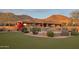 Lush backyard features beautiful landscaping, a pool, and breathtaking views of the surrounding mountains at 12711 N 117Th St, Scottsdale, AZ 85259