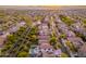 Wide aerial view showing a sprawling neighborhood with desert landscape at 14095 W Larkspur Dr, Surprise, AZ 85379