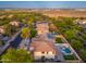 Aerial view of a neighborhood showcasing well-maintained homes and proximity to nearby amenities at 14095 W Larkspur Dr, Surprise, AZ 85379
