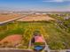 An aerial view of a community park with sports fields, playground, and picnic areas at 14095 W Larkspur Dr, Surprise, AZ 85379