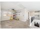 Upstairs bonus room features a ceiling fan, carpeted floors, and plenty of natural light at 14095 W Larkspur Dr, Surprise, AZ 85379