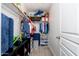 Organized closet with ample storage space, shelving, and hanging rods at 14095 W Larkspur Dr, Surprise, AZ 85379