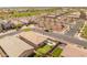 An aerial view showcasing the property's backyard oasis, patio, and landscaping within a vibrant community at 14166 W Valentine St, Surprise, AZ 85379