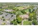 An aerial view showcasing community amenities including a pool, park, sports fields and well maintained homes at 14166 W Valentine St, Surprise, AZ 85379
