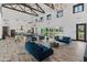 Spacious community room with stylish furnishings, a kitchen, and plenty of seating for social gatherings at 14166 W Valentine St, Surprise, AZ 85379