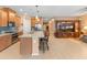 Spacious kitchen with a large island, stainless steel appliances, and plenty of storage at 14166 W Valentine St, Surprise, AZ 85379