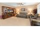 Cozy living room featuring a stylish entertainment center and comfortable seating at 14166 W Valentine St, Surprise, AZ 85379