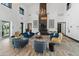 Bright and airy lounge features stylish seating arrangements and large windows for ample natural light at 14166 W Valentine St, Surprise, AZ 85379