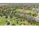 Aerial view of the neighborhood park including baseball fields and walking paths throughout at 14166 W Valentine St, Surprise, AZ 85379