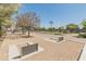 Picturesque recreation area featuring horseshoe pits, walking paths, and seating areas for relaxation at 14166 W Valentine St, Surprise, AZ 85379