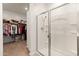 Bright bathroom featuring glass enclosed shower with closet storage space at 14166 W Valentine St, Surprise, AZ 85379