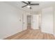 This bedroom has a closet, a ceiling fan, and access to another room at 16402 N 31St St # 232, Phoenix, AZ 85032