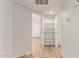 The hallway is bright and provides access to the bedroom at 16402 N 31St St # 232, Phoenix, AZ 85032