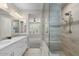 Shower and vanity in the main bathroom suite at 16945 W Vernon Ave, Goodyear, AZ 85395