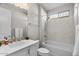 Clean bathroom boasts tub, shower, vanity, and toilet at 16945 W Vernon Ave, Goodyear, AZ 85395