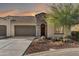 Charming single-Gathering home with well-manicured landscaping, desert accents, and a three car garage, ideal for suburban living at 16945 W Vernon Ave, Goodyear, AZ 85395
