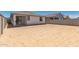 Expansive backyard featuring a blank canvas with potential for landscaping and outdoor activities at 16996 W Fetlock Trl, Surprise, AZ 85387