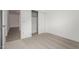 Bedroom featuring carpet, white walls, and an open closet at 16996 W Fetlock Trl, Surprise, AZ 85387