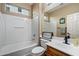 Bathroom features a tub and shower combination, a sink, and a toilet at 18585 E Ryan Rd, Queen Creek, AZ 85142