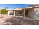 Charming backyard with a covered patio, perfect for outdoor living at 19740 N Wind Rose Way, Surprise, AZ 85374