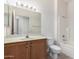 Bathroom featuring vanity with decorative cabinet, tile floor, and shower-tub combination at 19740 N Wind Rose Way, Surprise, AZ 85374