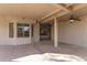 Covered patio with ceiling fans, offering a relaxing outdoor space at 19740 N Wind Rose Way, Surprise, AZ 85374