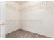 Walk-in closet with carpet and white shelving at 19740 N Wind Rose Way, Surprise, AZ 85374