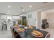 Stylish dining room open to the kitchen, perfect for Gathering gatherings and entertaining at 2068 E Orange St, Tempe, AZ 85281