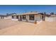 Inviting single-story home with a spacious driveway and quaint front porch at 2068 E Orange St, Tempe, AZ 85281