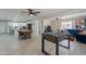 Open-concept living room featuring tiled floors, stylish decor, and modern furnishings at 2068 E Orange St, Tempe, AZ 85281