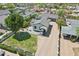 An aerial view showcases this cozy property with a backyard patio and detached two-car garage at 2316 N Mitchell St, Phoenix, AZ 85006