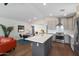 Bright, renovated kitchen features an island with white countertop and modern appliances in an open layout at 2316 N Mitchell St, Phoenix, AZ 85006