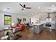Inviting living room features hardwood floors, stainless appliances, and contemporary decor, seamlessly blending style and comfort at 2316 N Mitchell St, Phoenix, AZ 85006