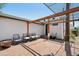 Charming brick patio with outdoor seating and a pergola-covered area at 2316 N Mitchell St, Phoenix, AZ 85006