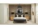 Modern bedroom with patterned wallpaper, stylish decor, and lots of light at 23196 W Marguerite Ave, Buckeye, AZ 85326