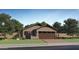 Charming single-story home with a two-car garage and low-maintenance desert landscaping at 23196 W Marguerite Ave, Buckeye, AZ 85326