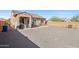 Wide open backyard with gravel landscaping perfect for a custom design at 26049 W Matthew Dr, Buckeye, AZ 85396
