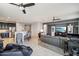 Open living space with barstool seating, integrated living room, and comfortable seating arrangements at 26049 W Matthew Dr, Buckeye, AZ 85396